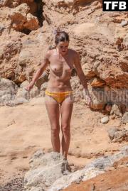 Emma Watson nude on the beach